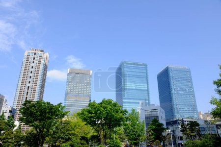 Photo for Modern skyscrapers buildings in the blue sky,  Japan - Royalty Free Image