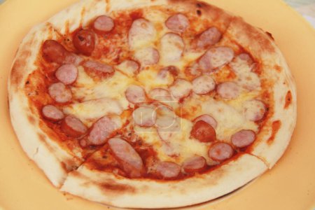 Photo for Hot pizza with cheese and sausage - Royalty Free Image