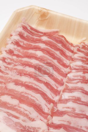Photo for Fresh and raw bacon on plate - Royalty Free Image