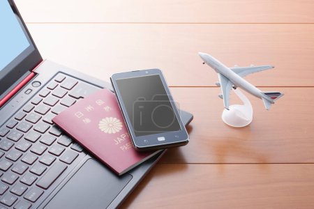 Téléchargez les photos : Ordinateur portable avec smartphone, passeport, avion, voyage au concept d'été. - en image libre de droit