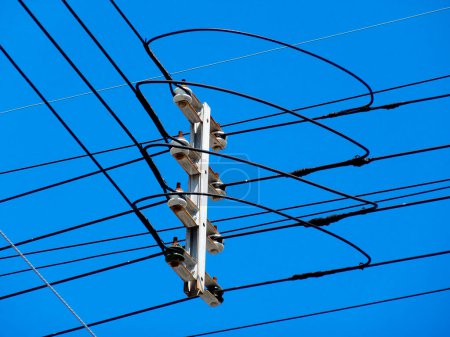 Photo for Electric power transmission lines and blue sky - Royalty Free Image