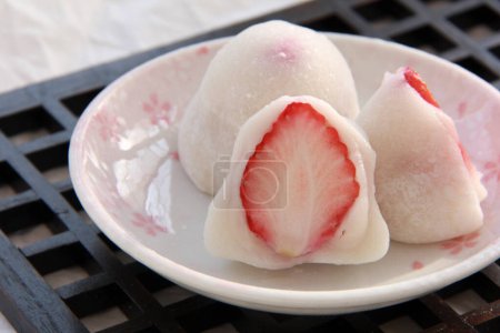 Photo for Cuisine photo of Japanese traditional dessert, mochi with strawberries - Royalty Free Image