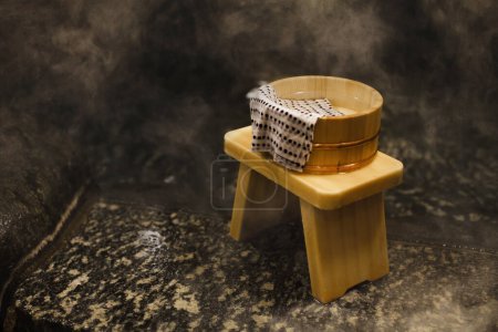 Photo for Close up view of pail and towel at hot springs, Japan - Royalty Free Image