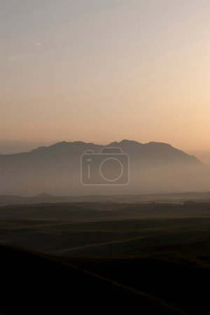 Photo for Beautiful sunset sky above scenic mountains - Royalty Free Image