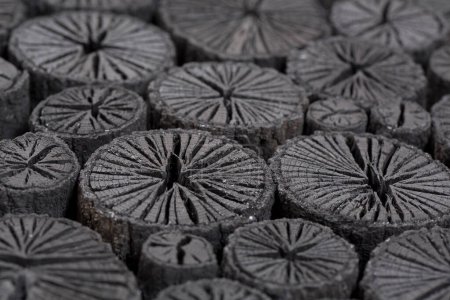 Photo for Black Natural wood charcoal on background, close up - Royalty Free Image
