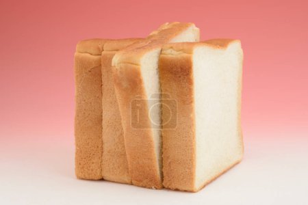 Photo for Bread slices on gradient pink background - Royalty Free Image