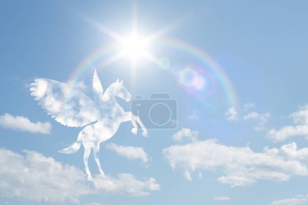 Photo for White flying horse in beautiful blue sky - Royalty Free Image
