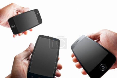 Photo for Set of hands holding black smartphones on white background. - Royalty Free Image