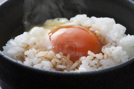 Photo for Bowl of tasty rice with raw egg, traditional Japanese cuisine - Royalty Free Image