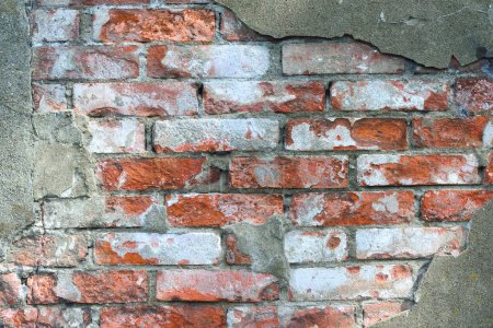 Téléchargez les photos : Fond d'un vieux mur de briques rouges. texture - en image libre de droit