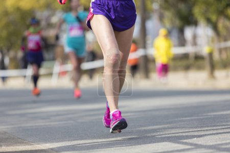 Photo for Cropped view of runner competing in a race - Royalty Free Image