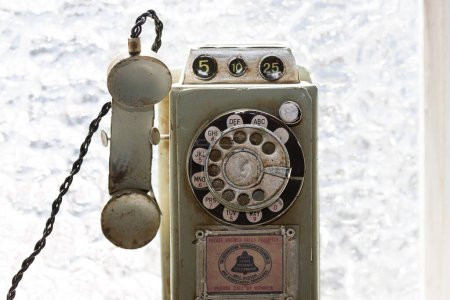 Photo for Old telephone on windowsill background, close up - Royalty Free Image