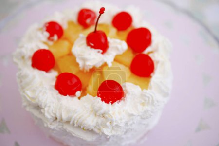 Photo for Strawberry Milk Cake with cherries on the top - Royalty Free Image