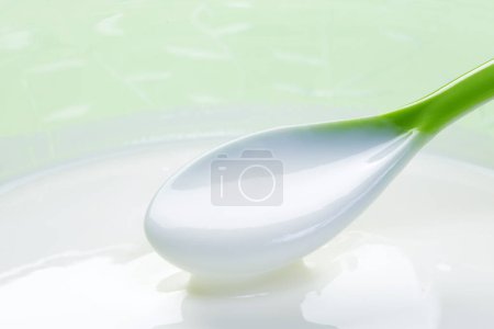 Photo for Spoon of yogurt, closeup - Royalty Free Image