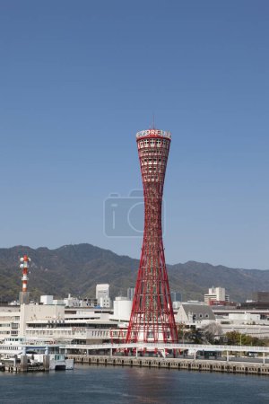 Kobe, Japan skyline at the port and red  tower.