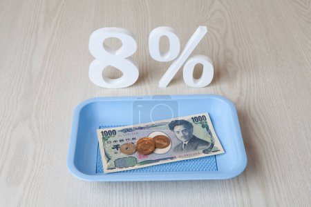 Foto de Monedas de yen japonés y billete de yen y 8% de fondo - Imagen libre de derechos
