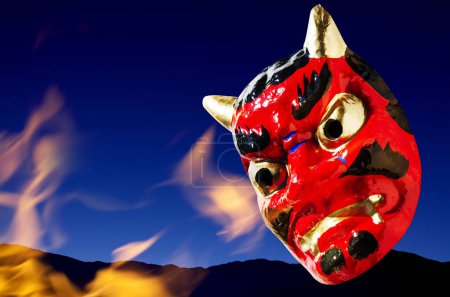 Japanese demon mask  with fire on  background