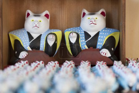 Photo for Traditional japanese beckoning cats. Lucky cats  in a shop - Royalty Free Image