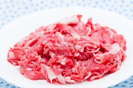 Téléchargez les photos : Morceaux de viande crue fond - en image libre de droit
