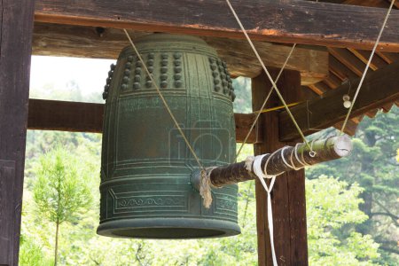 Photo for Close-up shot of sacred bell at ancient Japanese shrine - Royalty Free Image