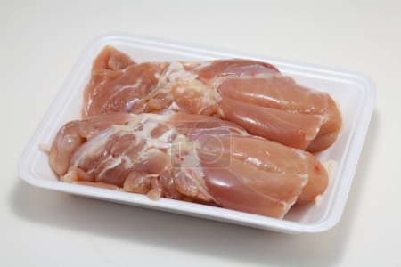 Photo for Close-up view of fresh raw meat in plastic container - Royalty Free Image