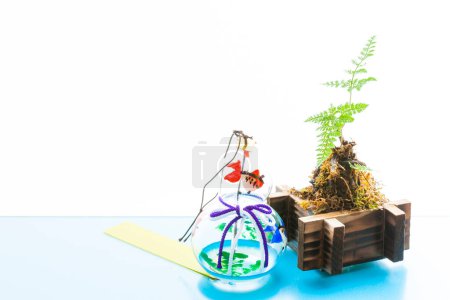 Photo for Japanese  wind chime ,"Edo Furin" and bonsai tree - Royalty Free Image