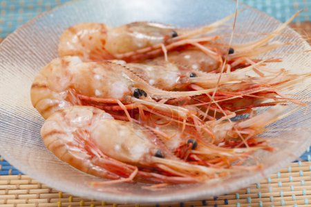 Photo for Shrimps on glass plate, closeup - Royalty Free Image