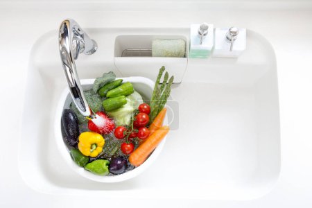 Photo for Various vegetables to be washed with shower water - Royalty Free Image