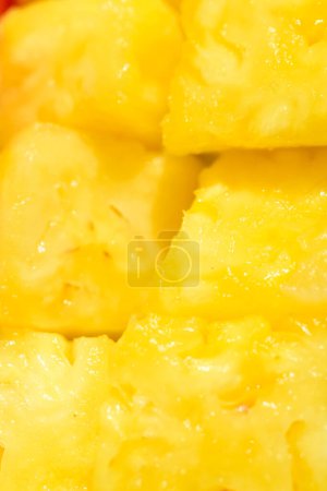 Photo for Pieces of sliced fresh pineapple, macro photo - Royalty Free Image