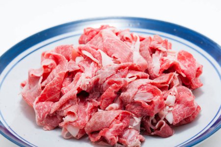 Photo for Raw meat pieces on plate - Royalty Free Image