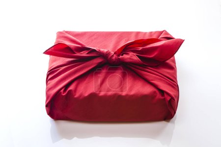 Photo for Present wrapped in a furoshiki on white background - Royalty Free Image