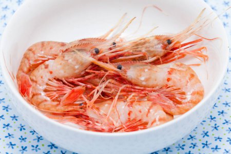 Photo for Shrimps with spices on a white dish - Royalty Free Image