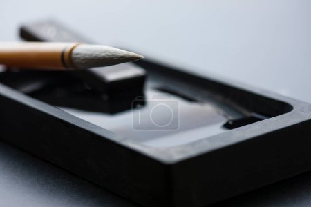 Photo for Traditional writing brush, Japanese writing brush on background, close up - Royalty Free Image