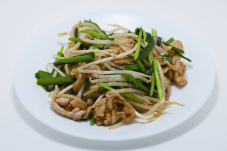 Photo for Plate of noodles with meat and greens - Royalty Free Image