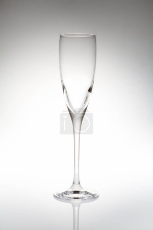 Photo for Empty wine glass on grey background, close up. - Royalty Free Image
