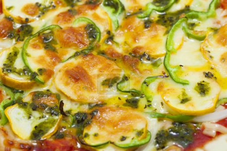 Photo for Pizza with zucchini and cheese on a plate - Royalty Free Image
