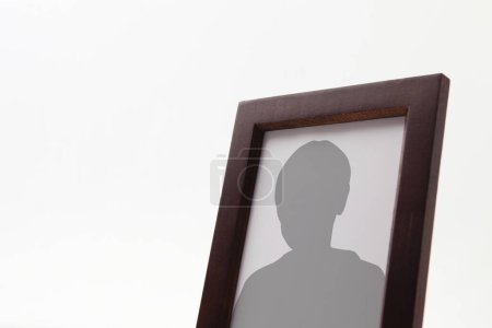 Photo for Funeral frame template with person silhouette - Royalty Free Image