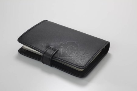 Photo for Leather notepad on white background, close up - Royalty Free Image