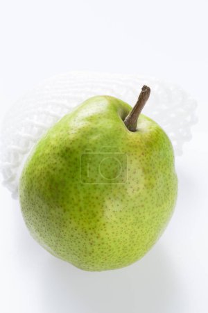 Photo for Fresh green pear on the white background - Royalty Free Image