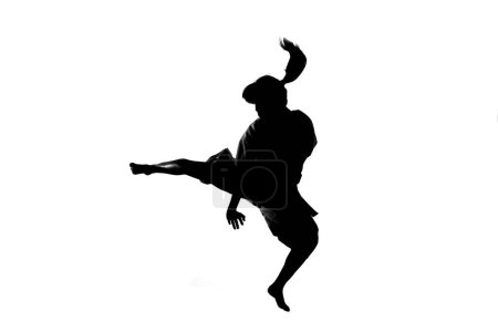 Photo for Silhouette of person practicing in martial arts in traditional kimono isolated on white background - Royalty Free Image