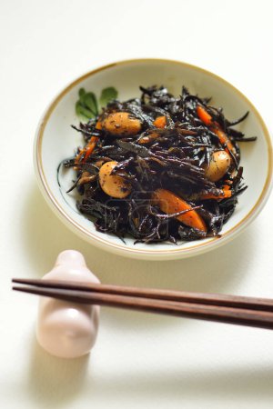 Photo for Asian traditional food, stir-fried seaweeds with beans and carrots - Royalty Free Image