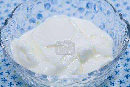 Photo for Fresh yogurt in glass bowl, healthy food - Royalty Free Image
