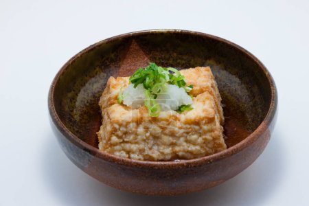 Photo for Japanese food , Grilled thick fried tofu in bowl - Royalty Free Image