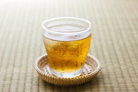 Photo for Glass with cold tea  on the table  background, close up - Royalty Free Image
