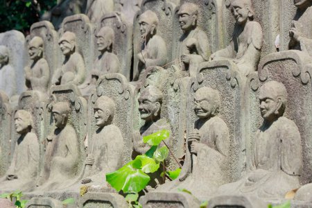 Religious statues in temple in Meguro, Tokyo, Japan. 