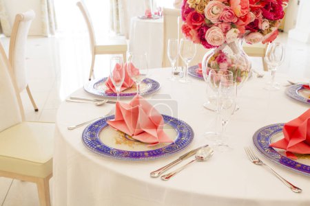 Photo for Beautiful wedding table setting with flowers - Royalty Free Image