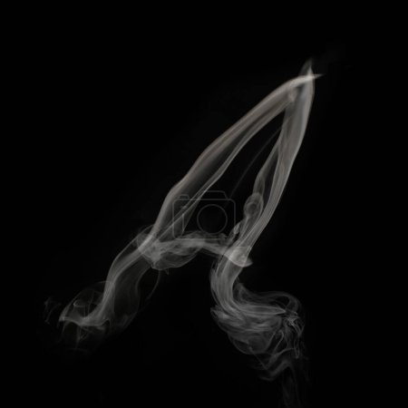Foto de Humo sobre fondo negro abstracto. Letra A - Imagen libre de derechos