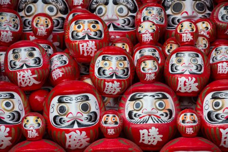 Photo for Daruma dolls are thought to be somewhat like a good luck charm in Japan - Royalty Free Image