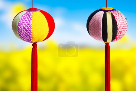 Photo for Bright hanging Japanese decorations, traditional Asian handcraft, Mari balls - Royalty Free Image