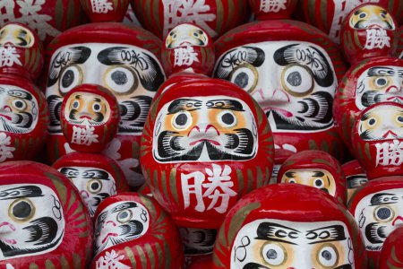 Photo for Daruma dolls are thought to be somewhat like a good luck charm in Japan - Royalty Free Image